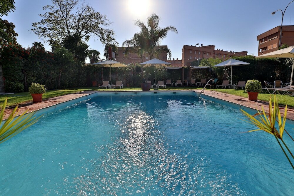 Фото Oasis Cordoba Hotel