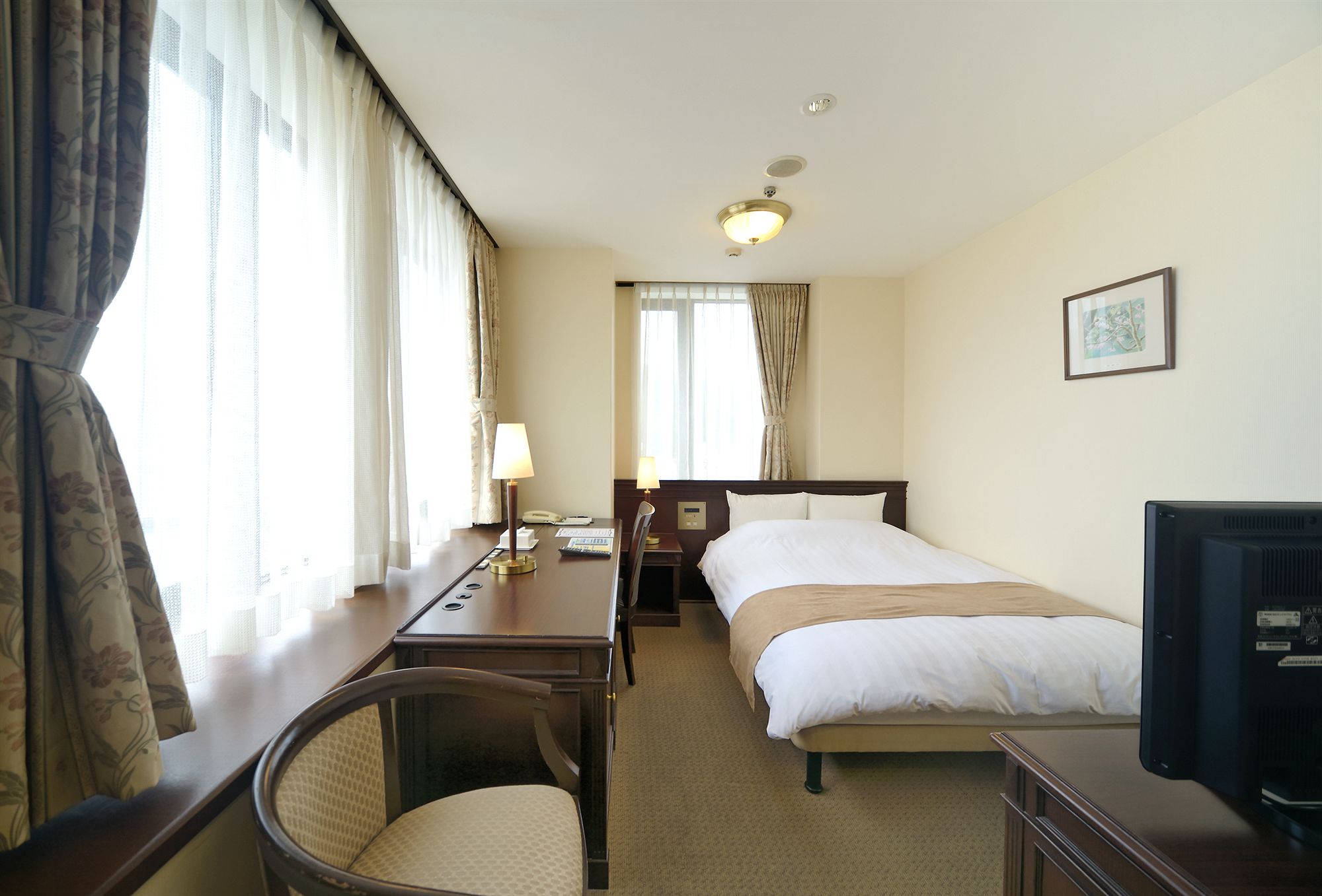 Фото Amami Sunplaza Hotel