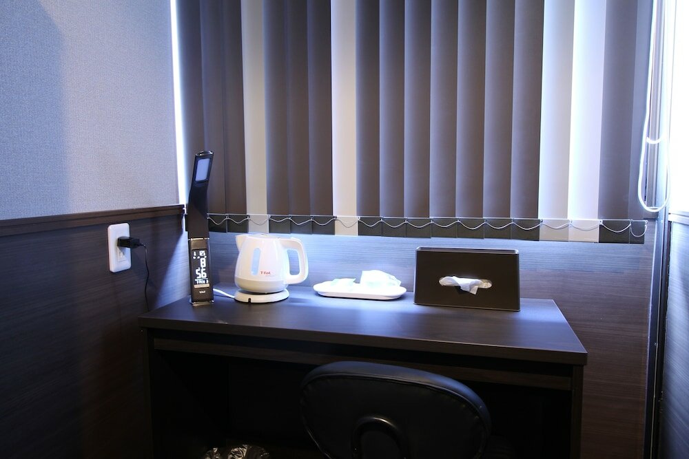 Фото Sejour Inn Capsule