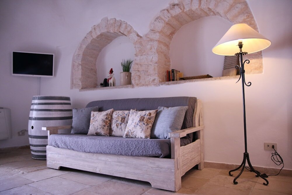 Фото Trulli Holiday Albergo Diffuso