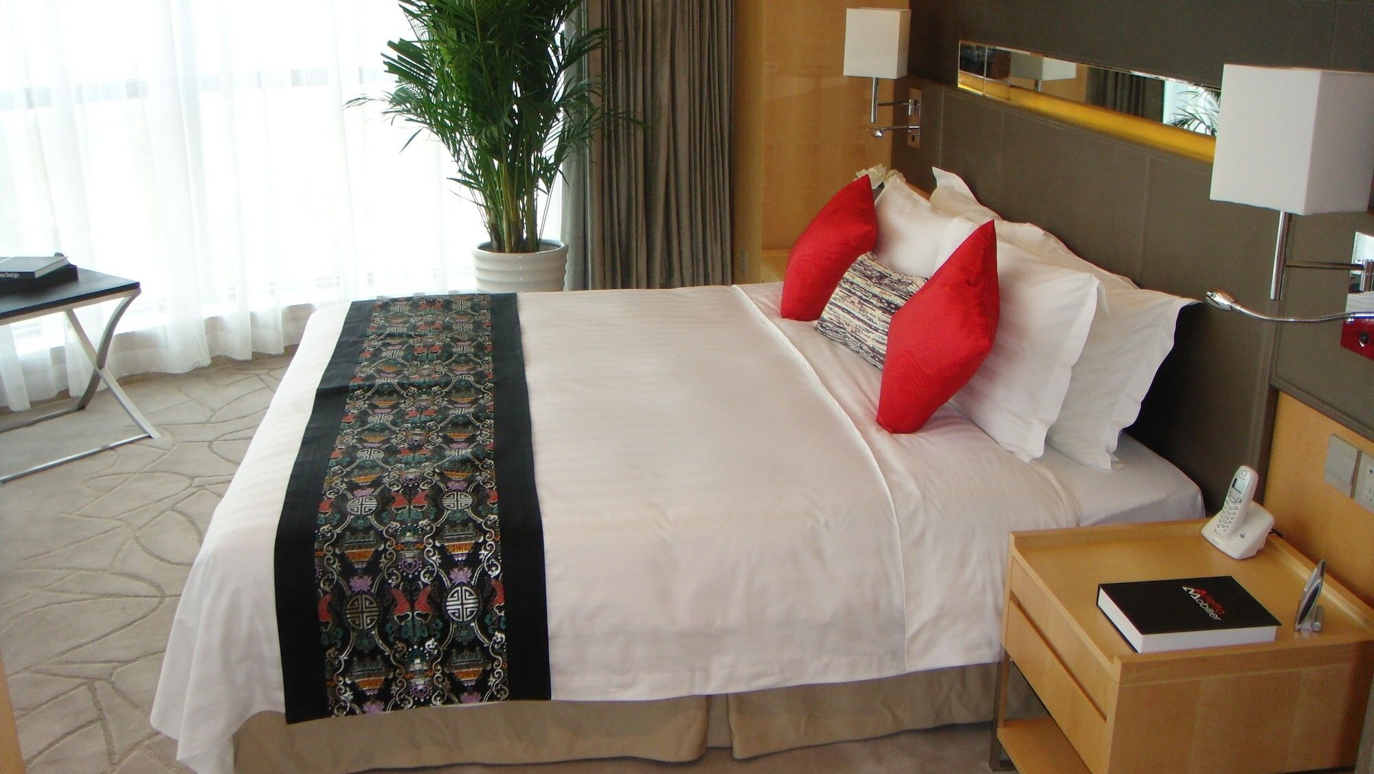 Фото Ascott Raffles City Beijing
