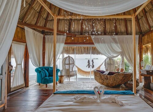 Гостиница Overwater villa with pool Aruba