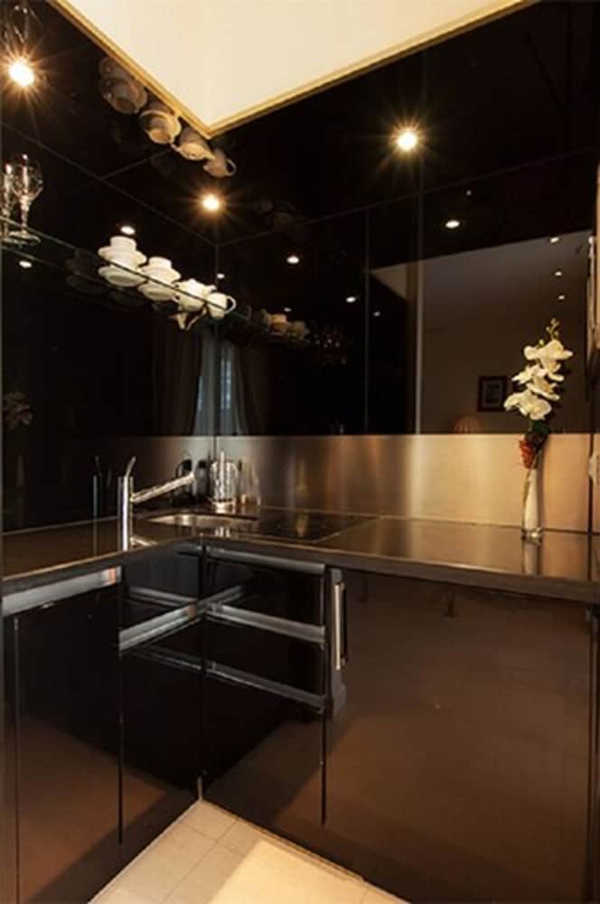 Фото Apartamentos Guadalpin Boutique