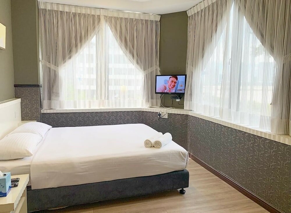 Фото Wang's Hotel Gurney Drive