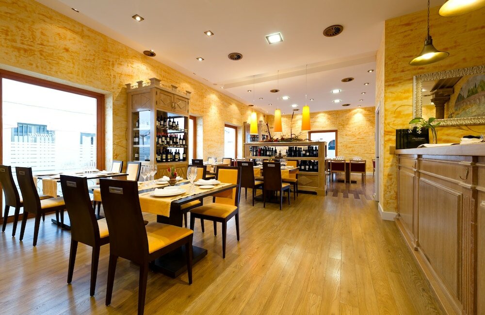 Фото Aparthotel Capitolina