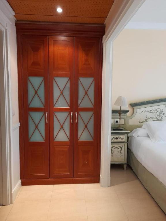 Фото Apartamentos Guadalpin Boutique