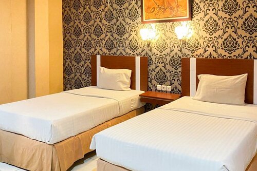 Гостиница Oyo 3936 Hotel Trisula Makassar