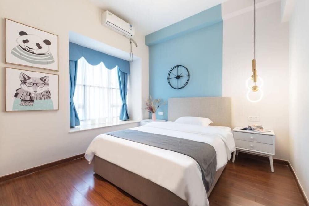 Фото Guangzhou Yi Long International Apartment
