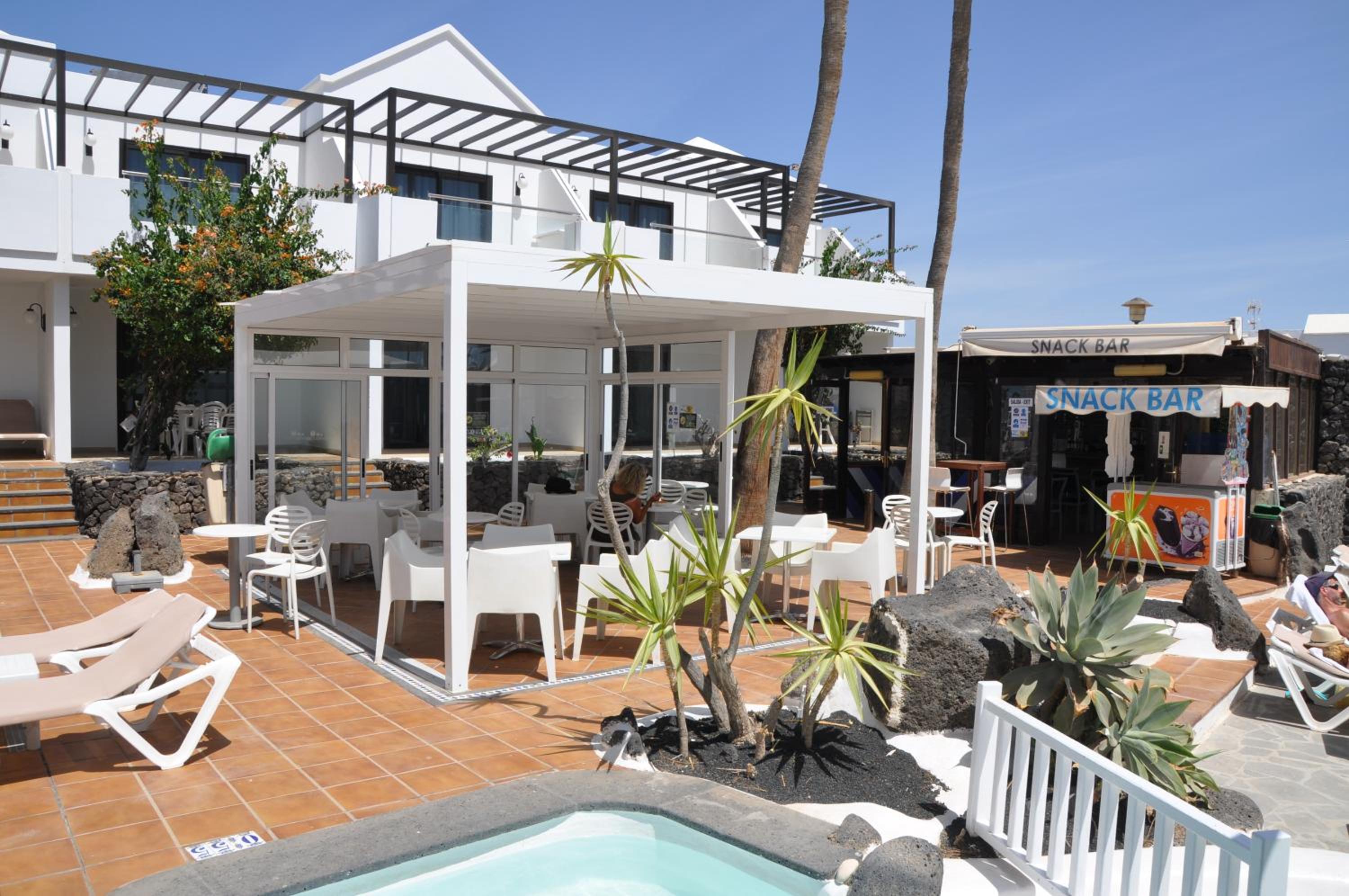 Фото Apartamentos Los Tulipanes