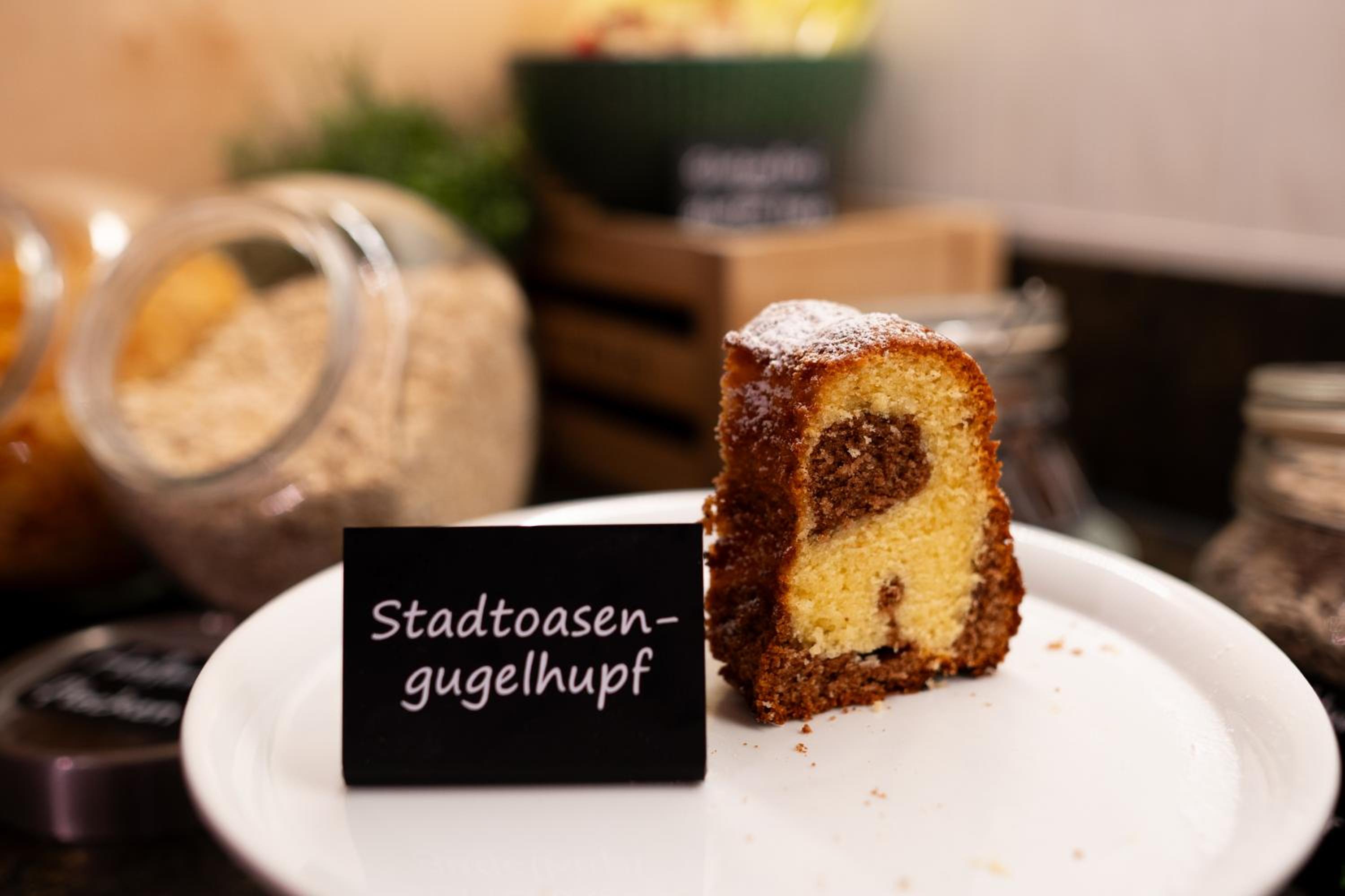 Фото Stadtoase Kolping Hotel