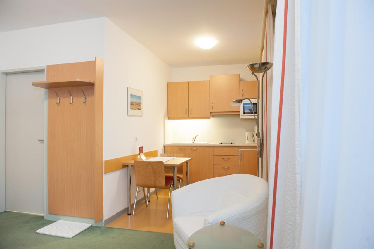 Фото Stadtoase Kolping Hotel