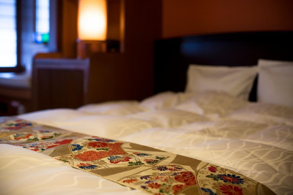 Фото Kinosaki Onsen Hanakouji Saigetsu