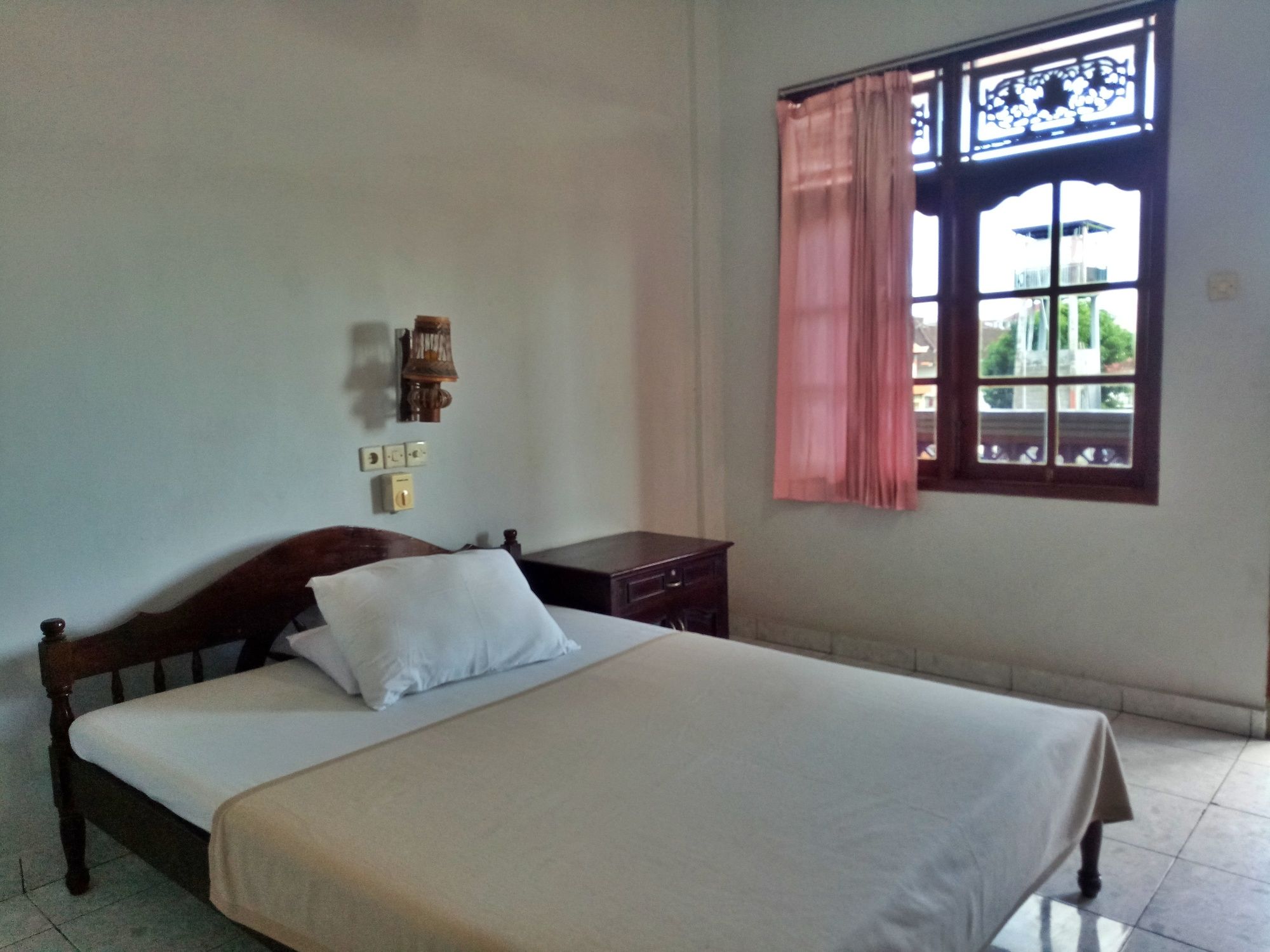 Фото Taman Mekar Beach Inn 2