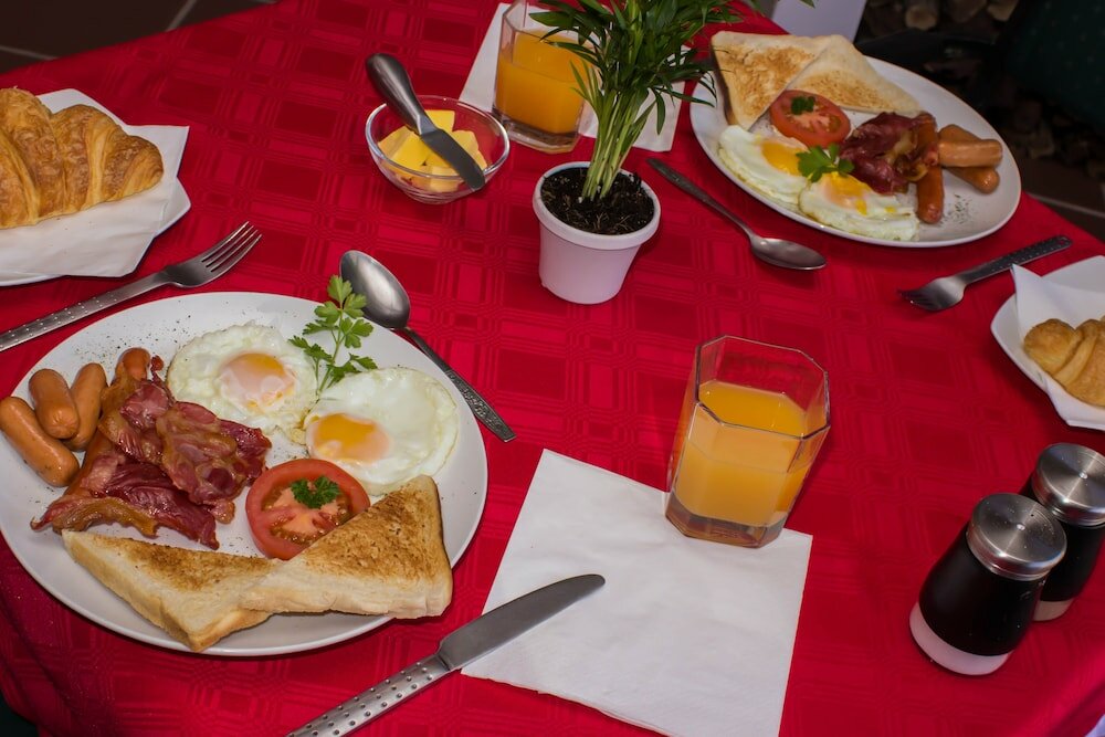 Фото Oppi Hoek Guesthouse