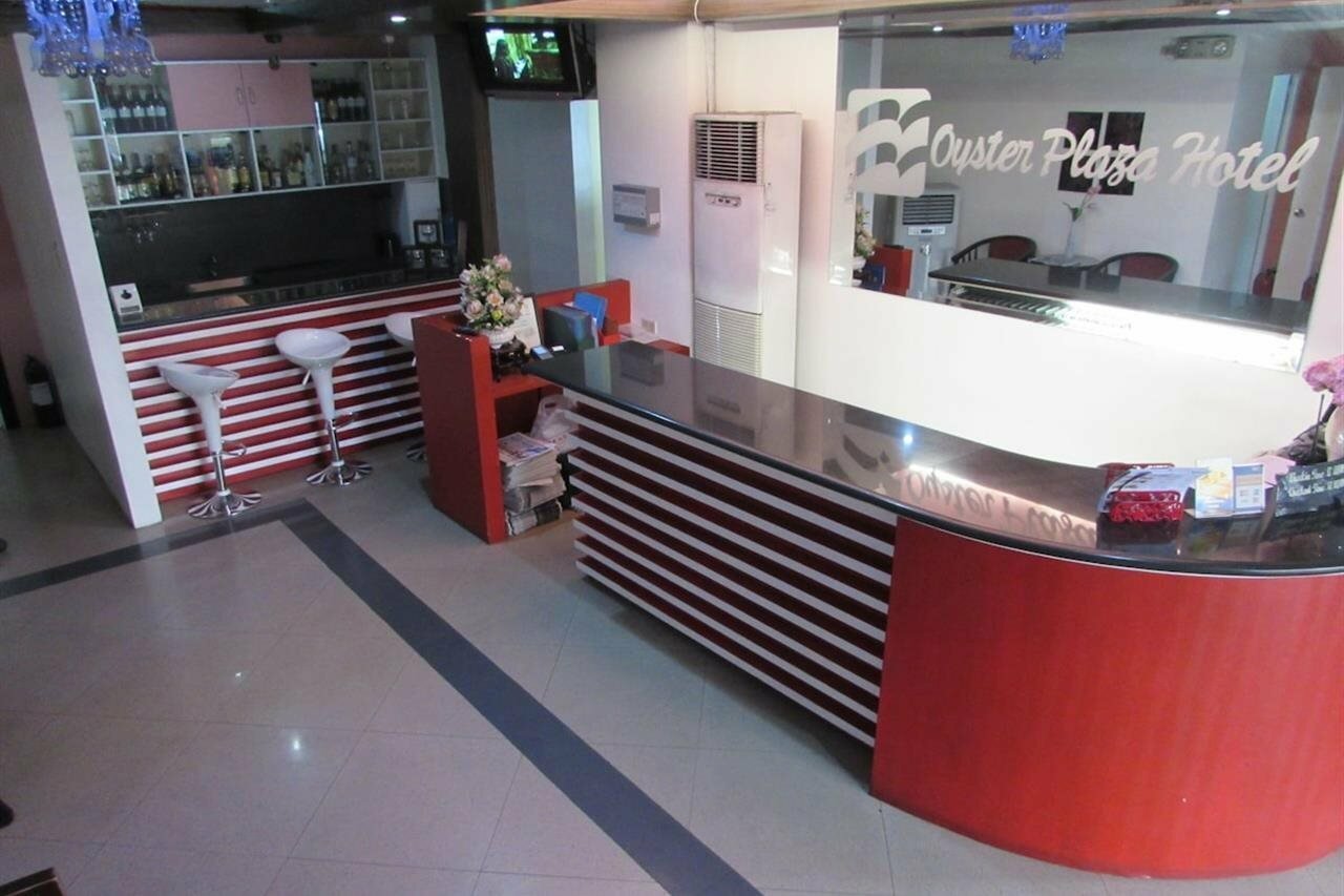 Фото Oyster Plaza Hotel