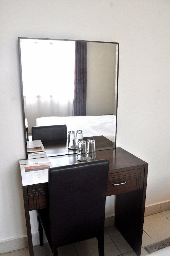 Фото Quiet Haven Hotel