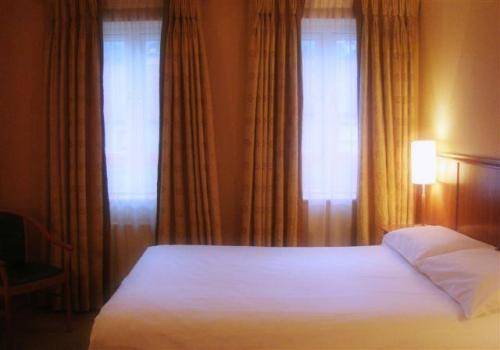 Фото Kilkenny Inn Hotel