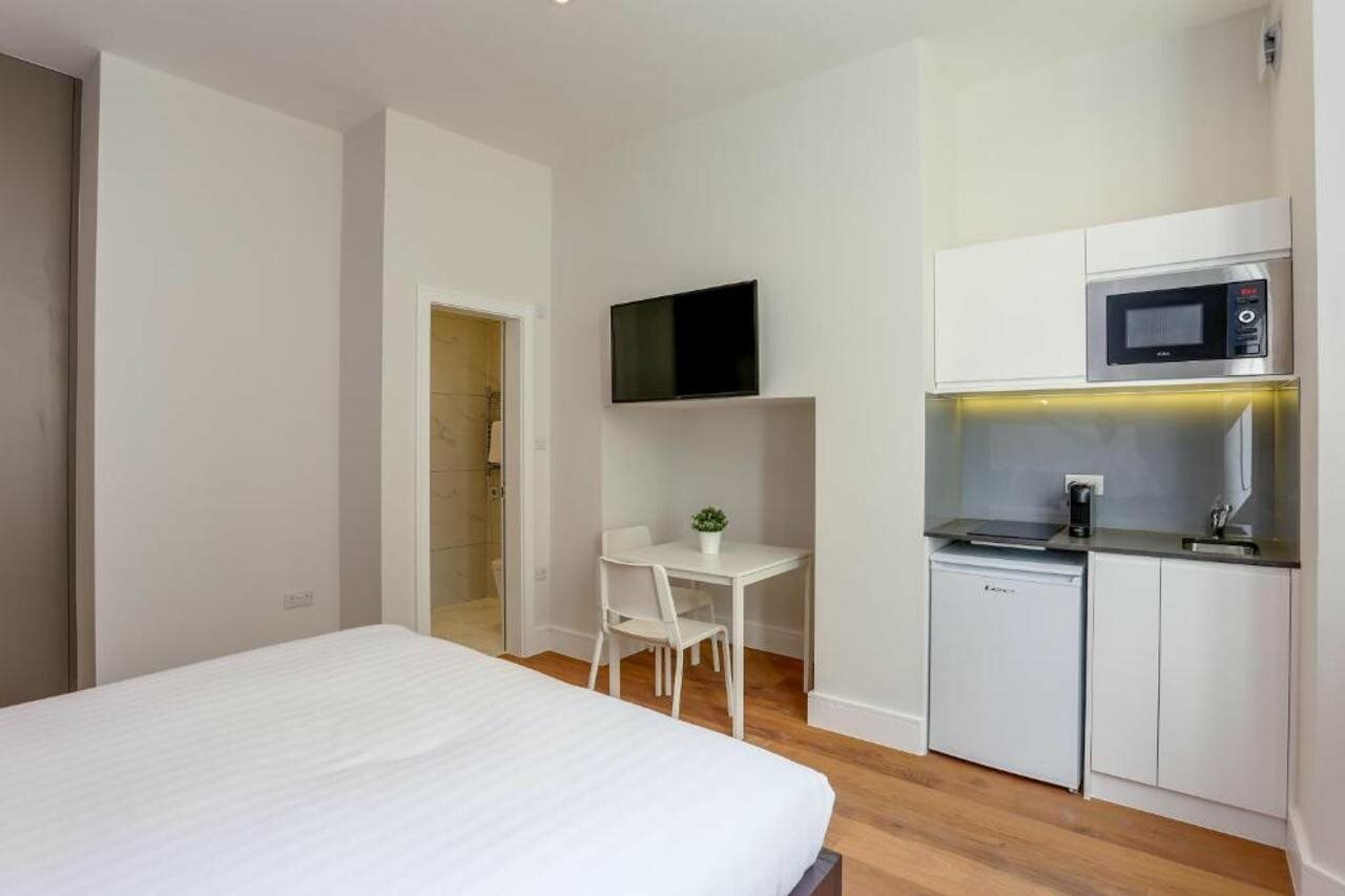 Фото Queensborough Terrace Service Apartments