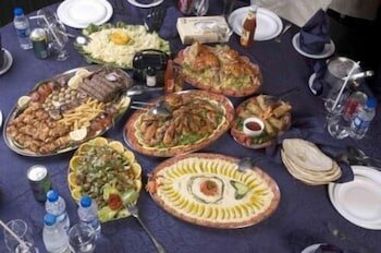 Фото Al Muntazah Plaza Hotel