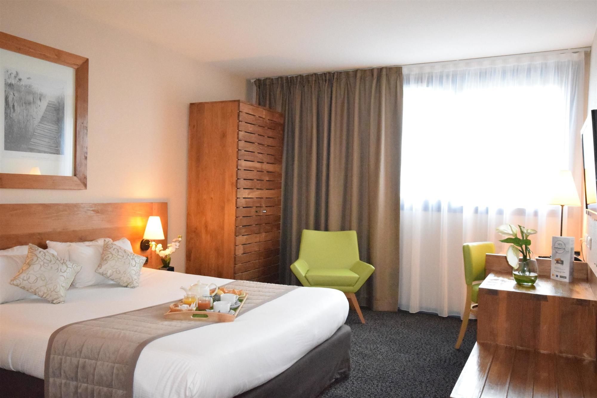 Фото Kyriad Prestige Bordeaux Ouest Mérignac