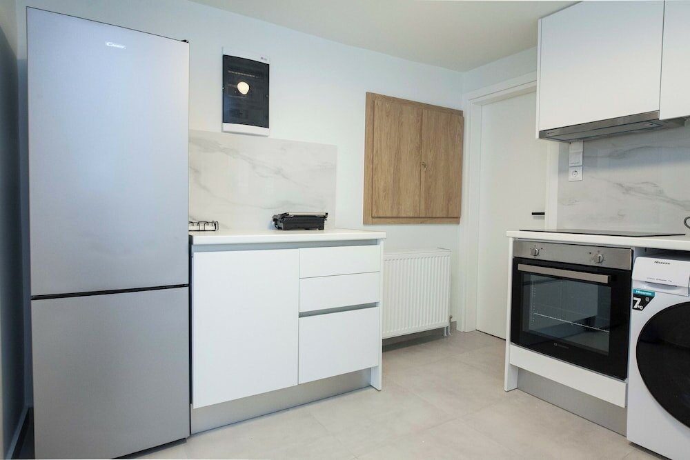 Фото Cozy 1 Bd Basement Apt in Pagrati