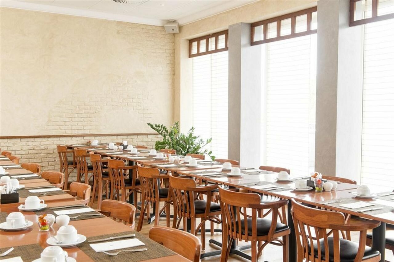 Фото Nh Fribourg Hotel