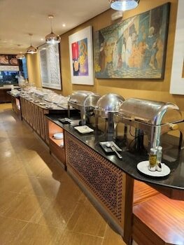 Фото El Oumnia Puerto & SPA