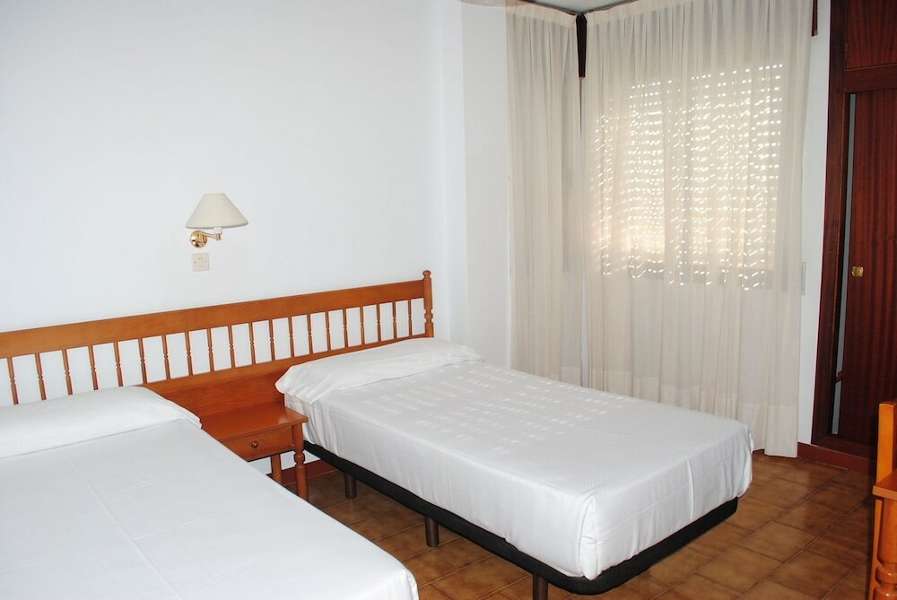 Фото Apartamentos Turisticos Suaces