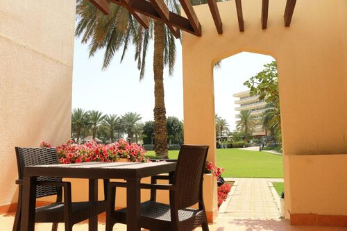 Гостиница Radisson Blu Hotel & Resort Al Ain в Аль-Айне