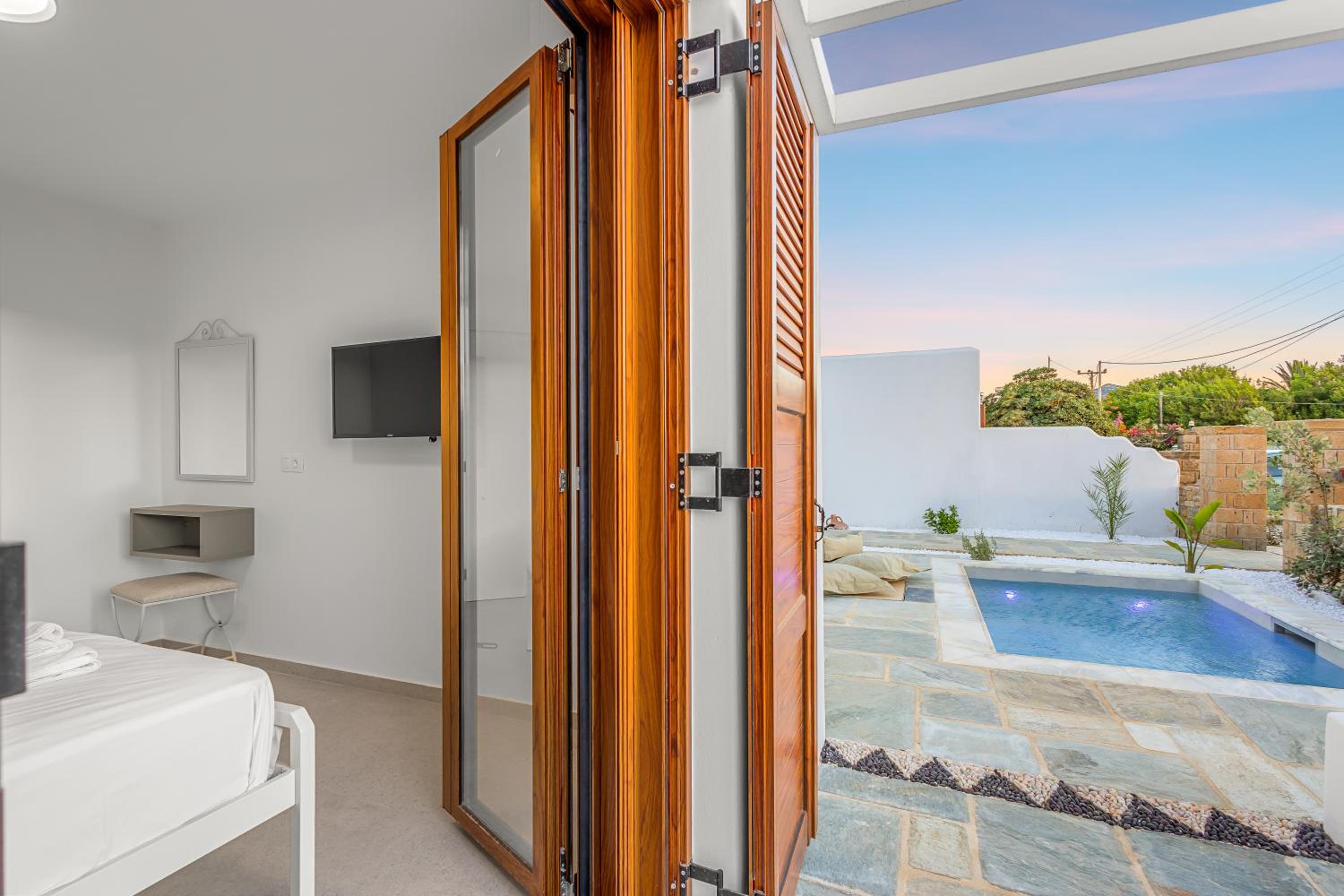 Фото Anemonisia Deluxe Apartments & Mesonettes