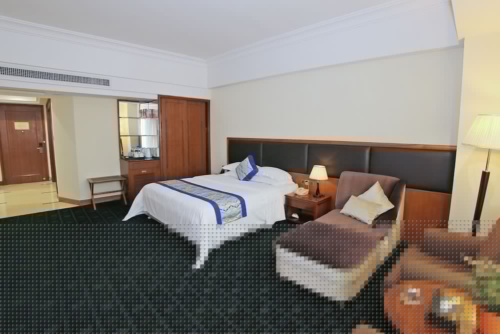 Фото Jiangmen Gladden Hotel