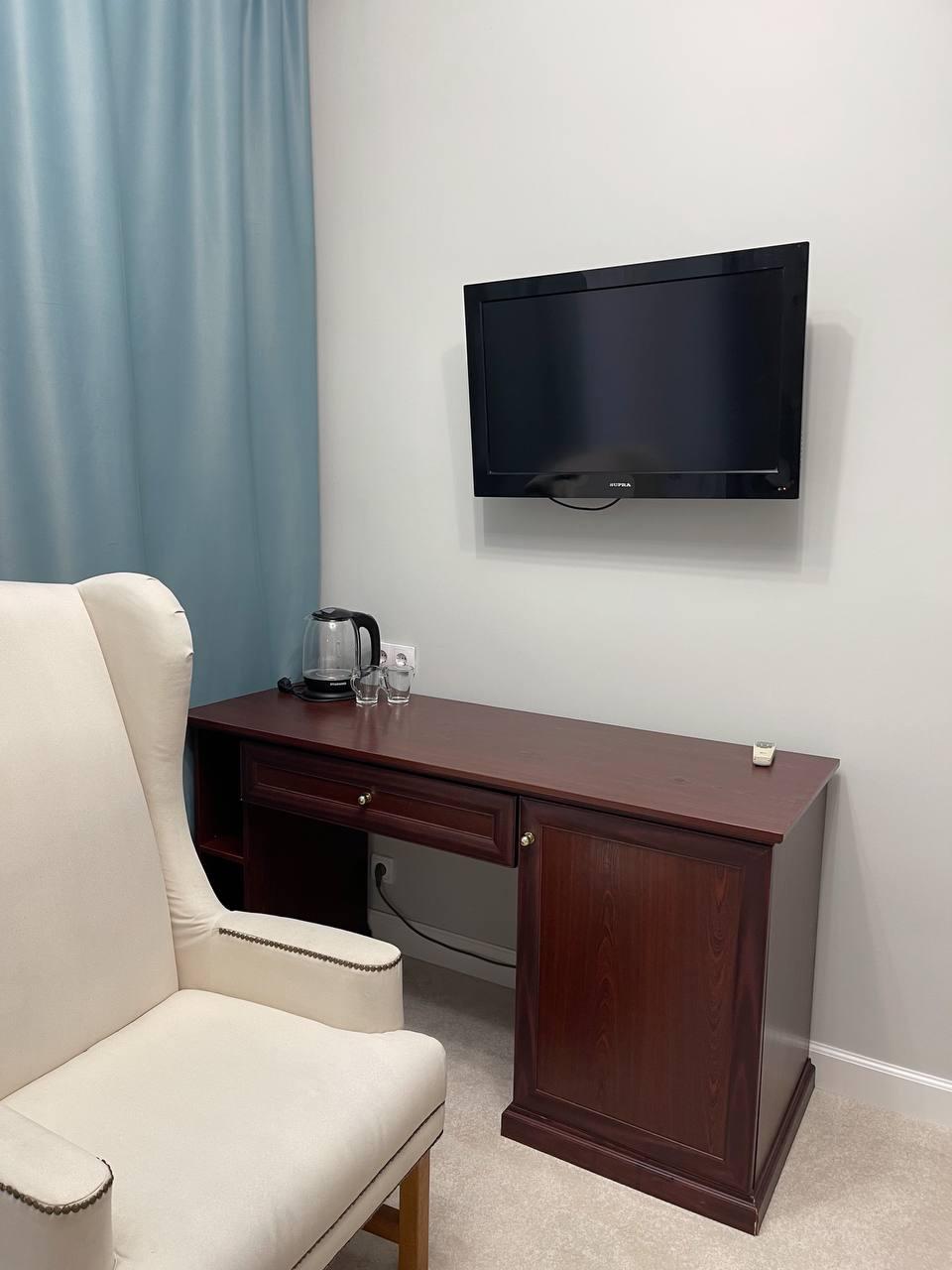 Фото Городской отель Гости