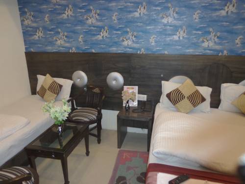 Фото Hotel Guruvas Inn