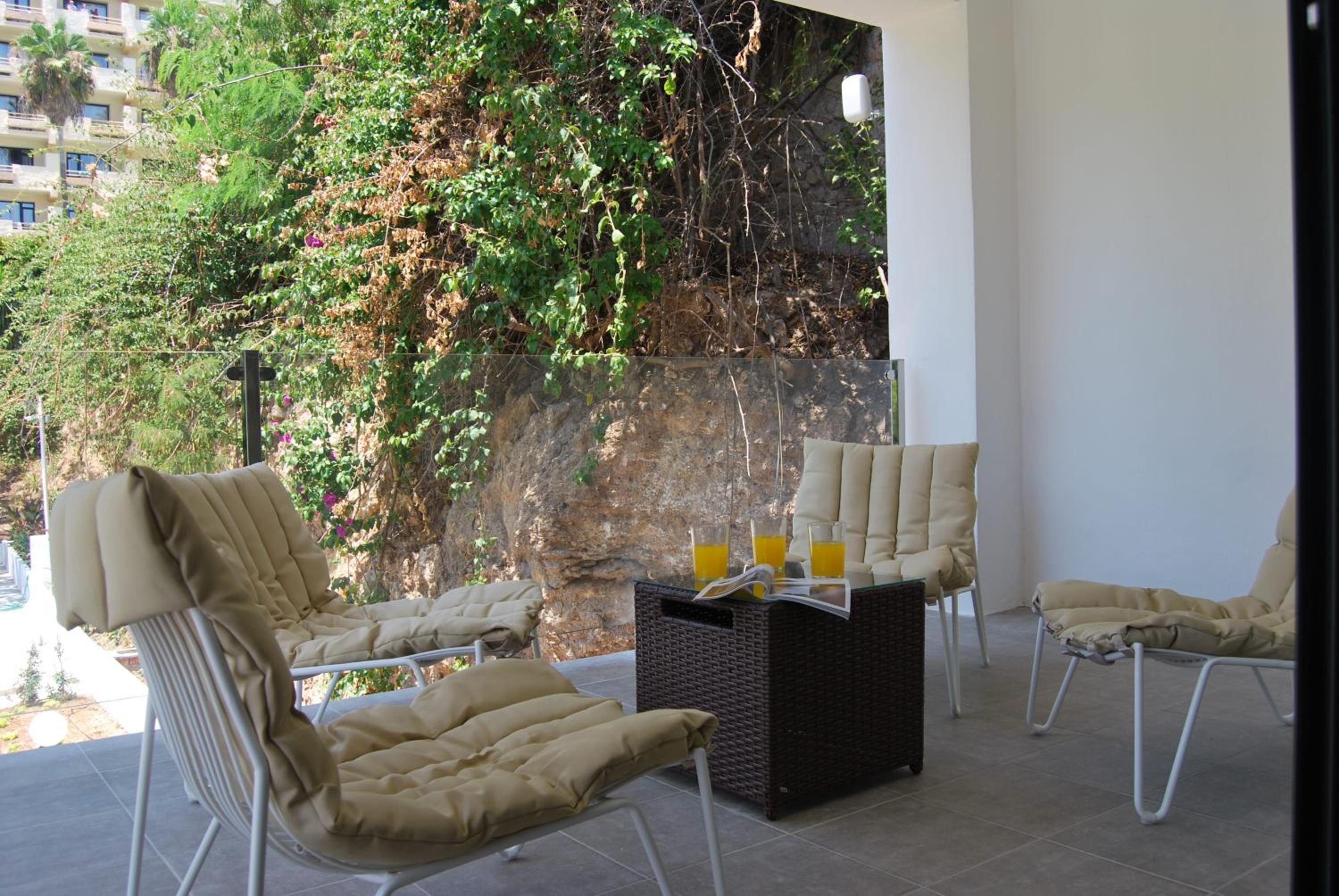 Фото Dimona Suites