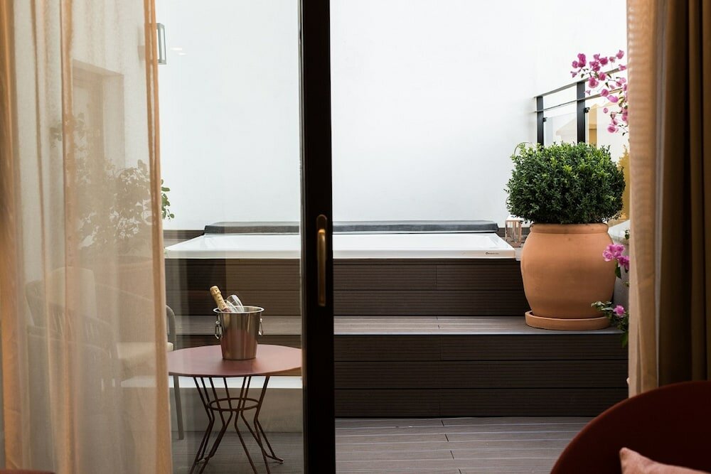 Фото Suites Murillo Plaza Sta Cruz