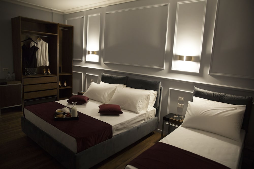 Фото Unicum Roma Suites