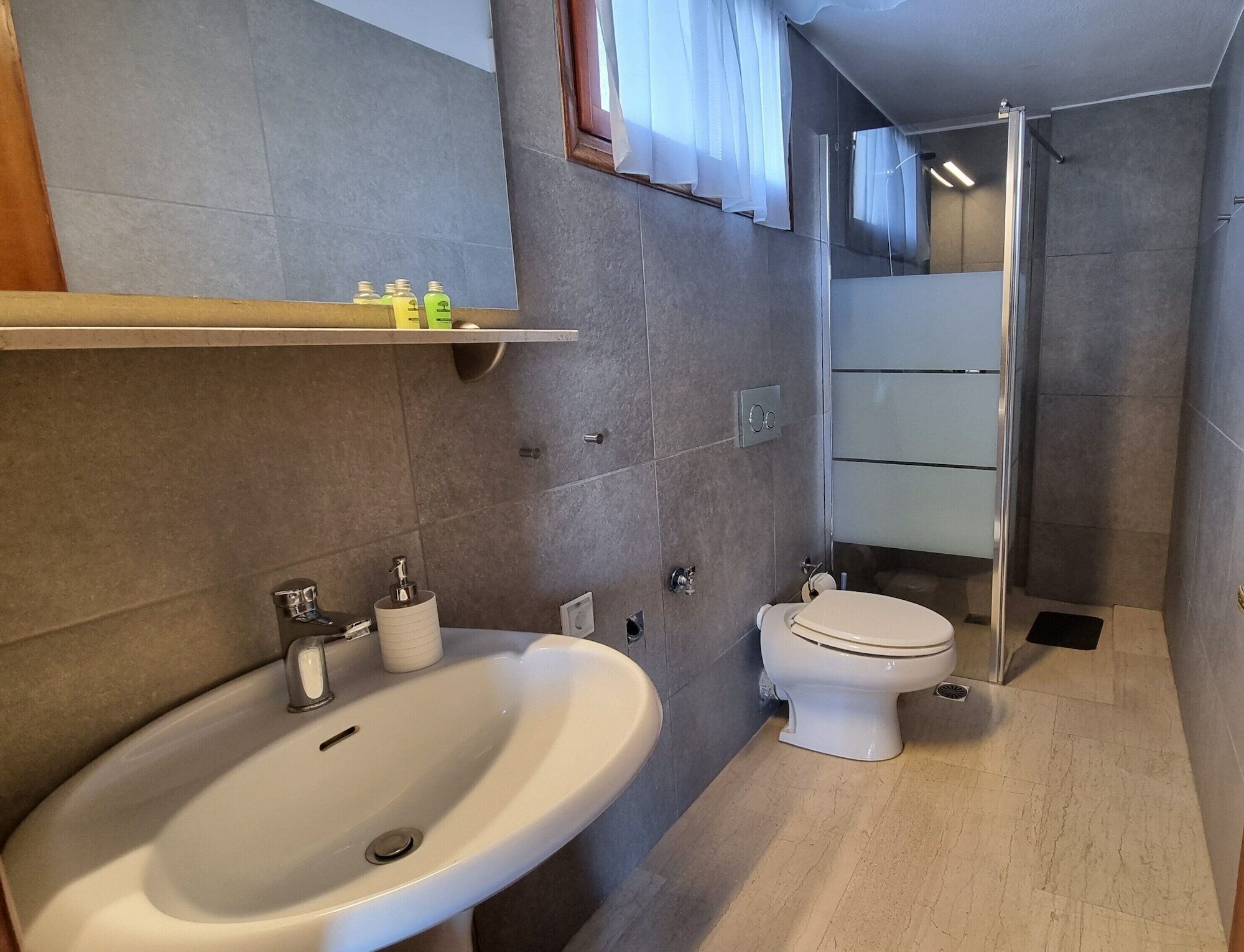 Фото Melas Apartments