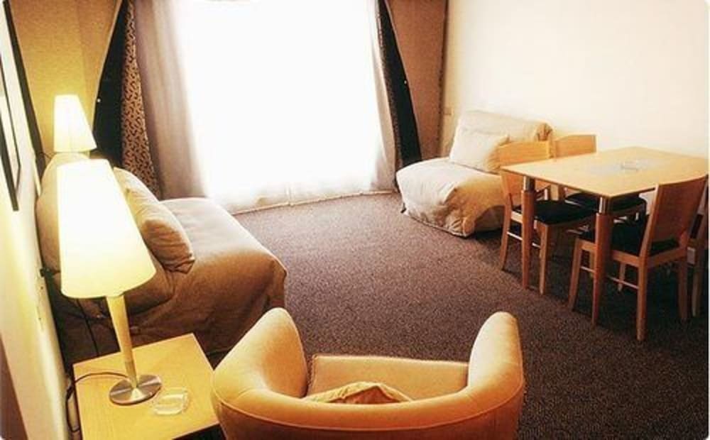 Фото Urbana Suites