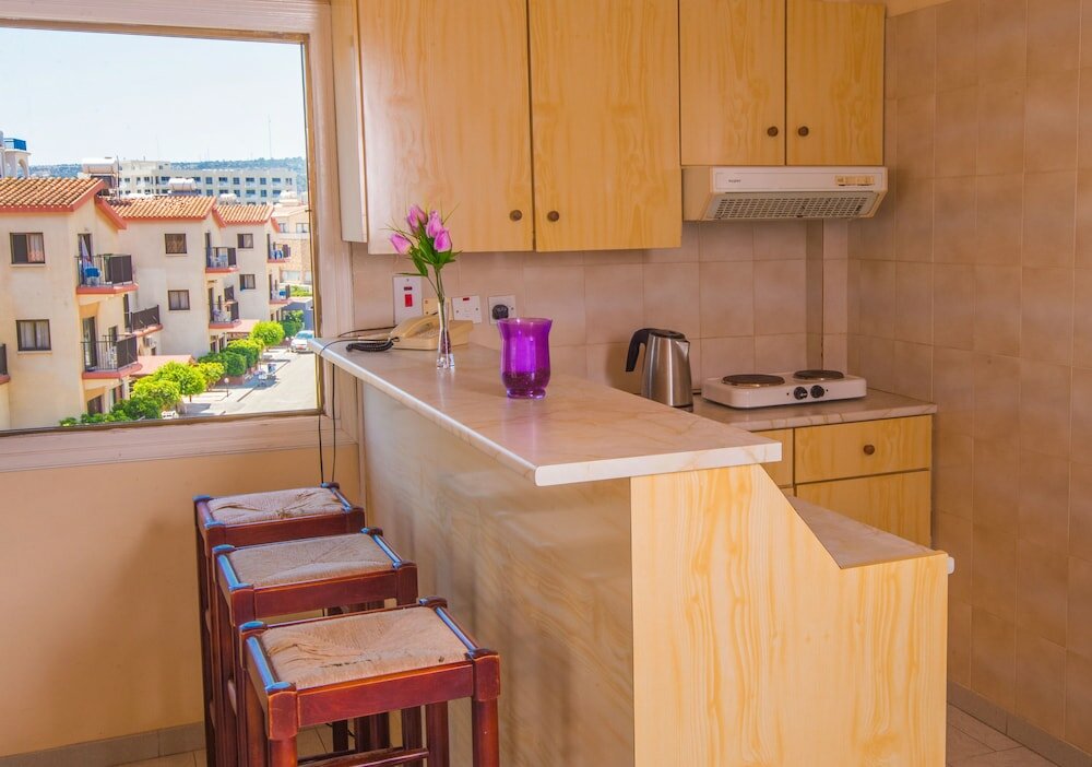 Фото Windmills Hotel Apartments