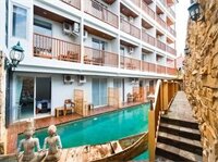 Фото Hadi Poetra Hotel