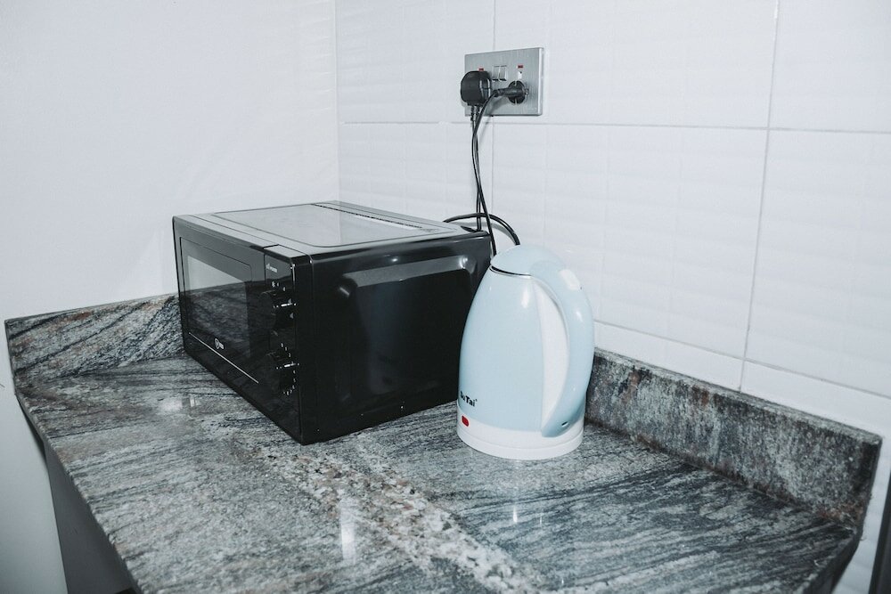 Фото Cozy Oasis Kyanja