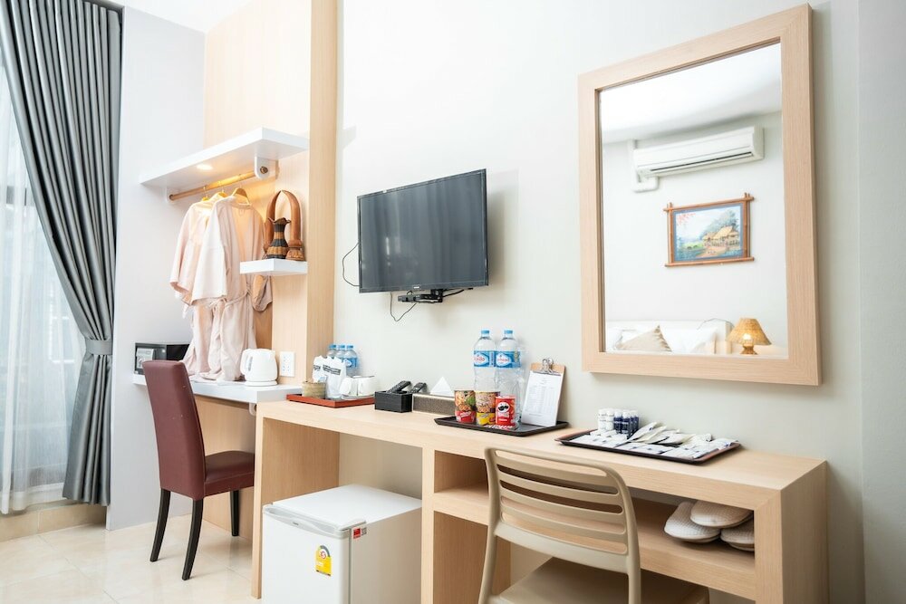 Фото Vongkhamsene Boutique Hotel