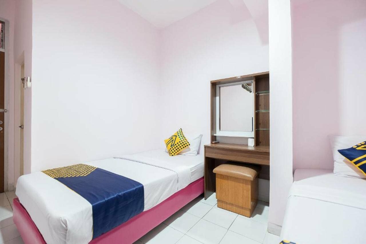 Фото Spot On 2214 Wisma Jampea