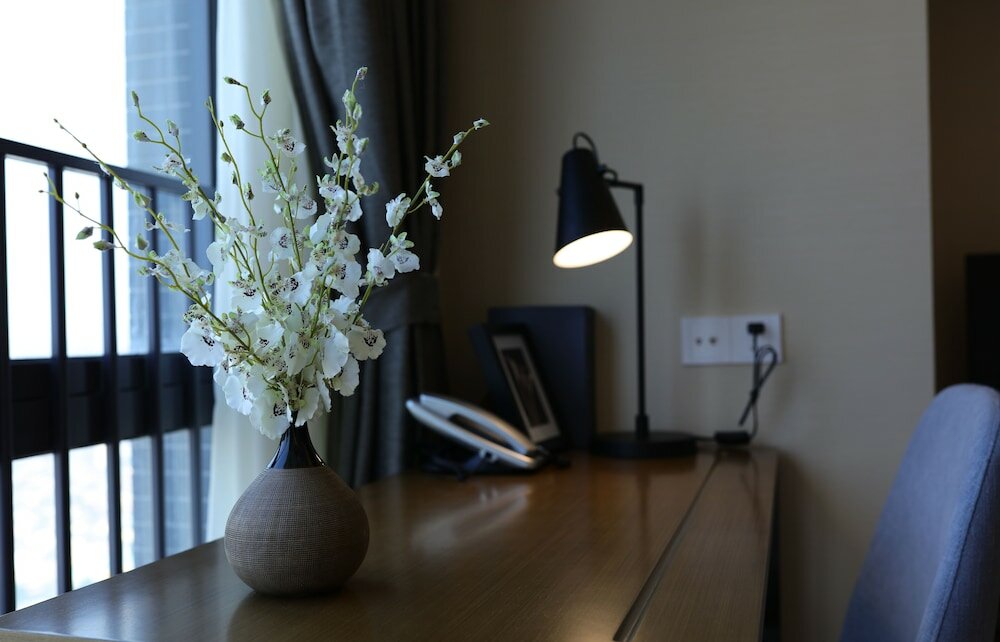 Фото Yuwa Serviced ApartHotel