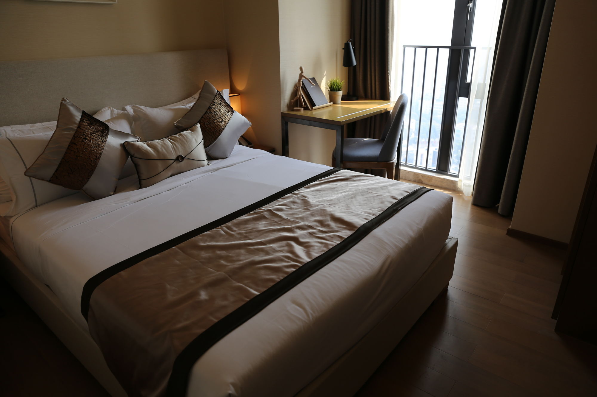 Фото Yuwa Serviced ApartHotel