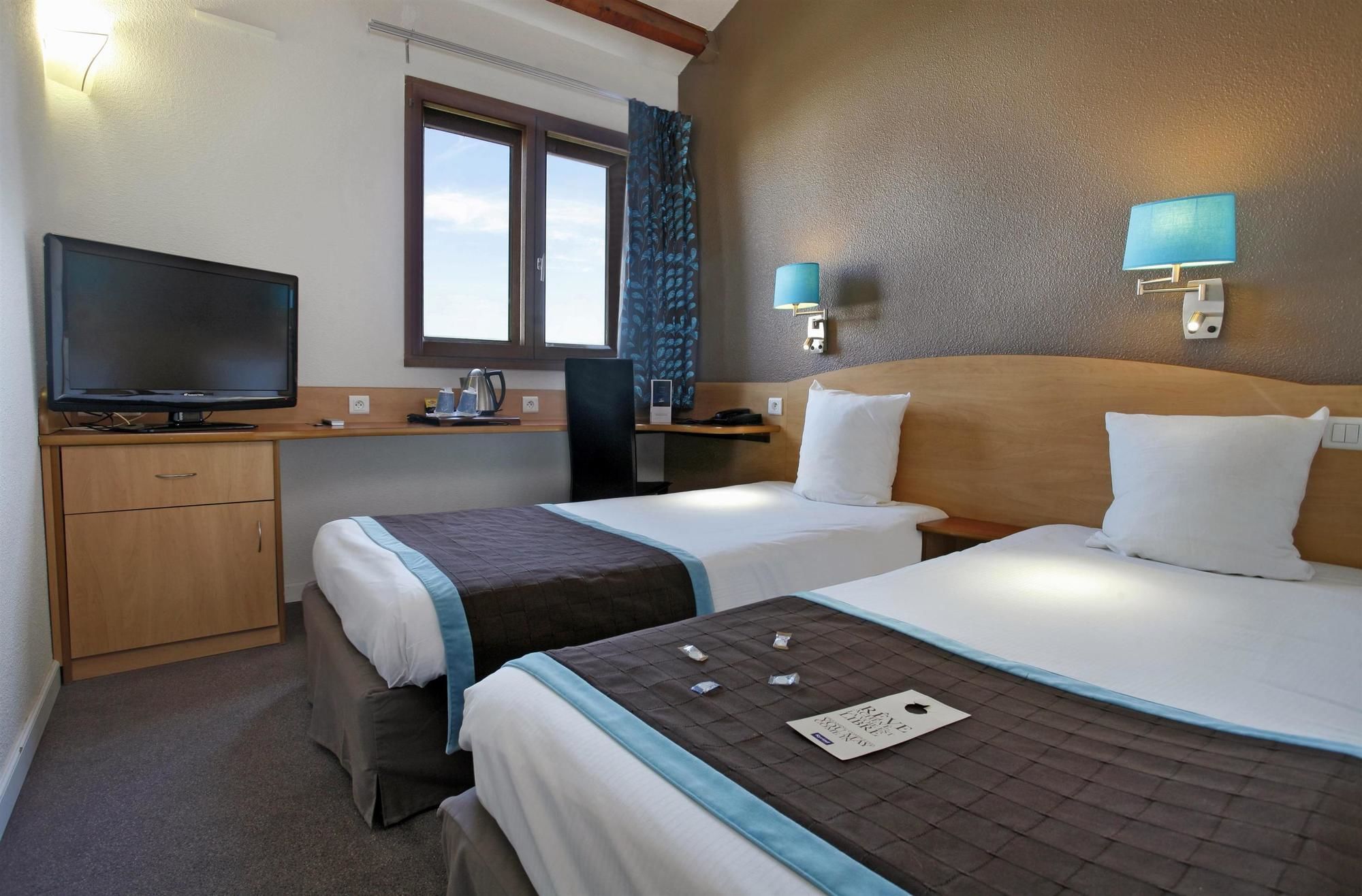 Фото Kyriad Montpellier Aeroport Gare Tgv Sud de France