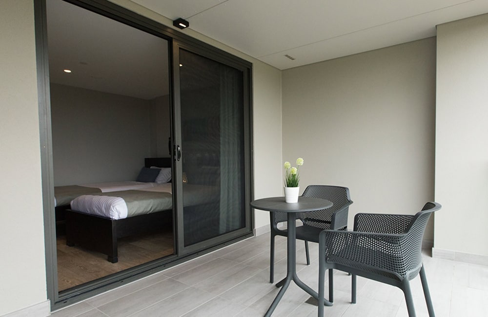 Фото Studio 8 Residences - Adults Only