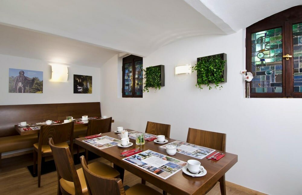 Фото Hotel Am Hofgarten