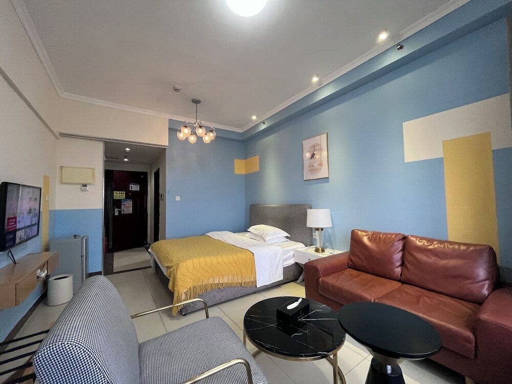 Фото Guangzhou Yi Long International Apartment