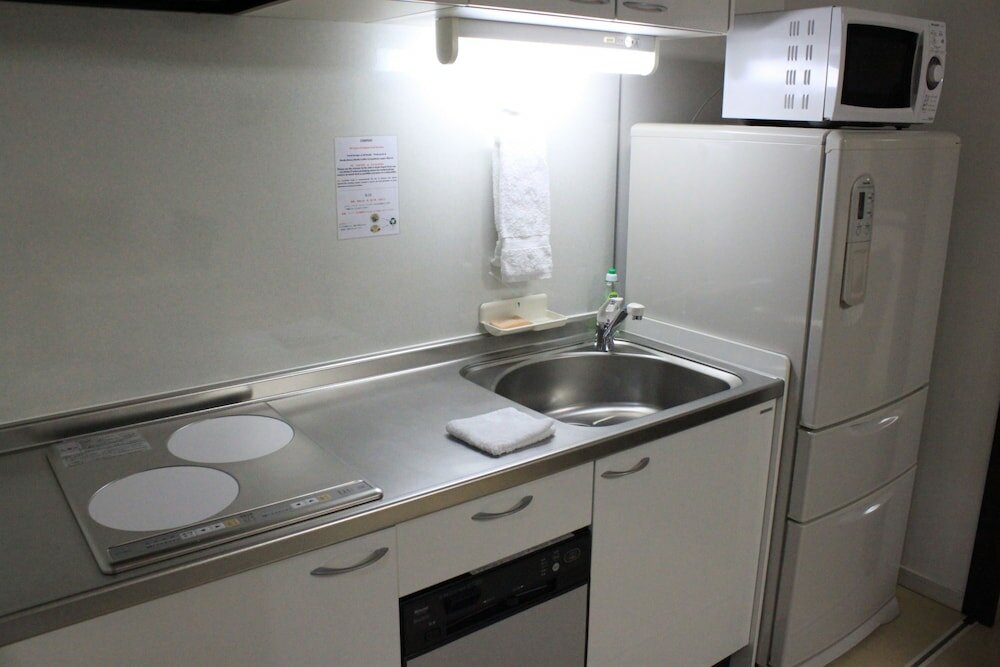 Фото Tsuru Apartments